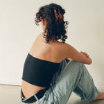 Big Effing Clip in Tortoise model sitting with Big Effing Clip in Tortoise in hair