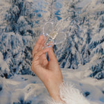 Cozy Clip In Snowed In holding a Cozy Clip in Snowed In