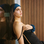 Denim Darling Headband model standing with Denim Darling Headband in hair