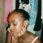 Disco Scrunchie in Silver Sequin model wearing Disco Scrunchie in Silver Sequin