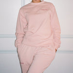 Limited Edition Sweat Top Standing while wearing Limited Edition Sweat Set