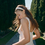 Halo Headband in Ivory model wearing Halo Headband in Ivory