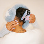 Ice Princess Clip In Sweet Cloud closeup of model wearing Ice Princess Clip In Sweet Cloud + Sugar Muffs in Winter Dream