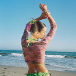 Big Effing Clip in Blossom model standing with Big Effing Clip in Blossom + Midi Super Bloom Clip in Honeydew in hair