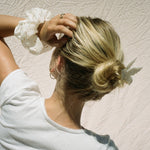 Papillon Clip in Meringue model with Papillon Clip in Meringue in hair