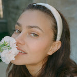 Halo Headband in Ivory closeup of model wearing Halo Headband in Ivory