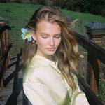 Super Bloom Clip in Maui closeup of model with Super Bloom Clip in Maui in hair