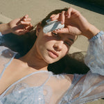 Sweetheart Clip in Something Blue model holding Sweetheart Clip in Something Blue