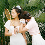 Terry Cloth Scrunchie in Beach Berry model wearing Terry Cloth Scrunchie in Beach Berry