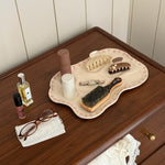 Cosa Ceramica x Emi Jay Vanity Tray in Pink Daisy with assorted hair care and accessories on dresser with glasses and emi jay fabric