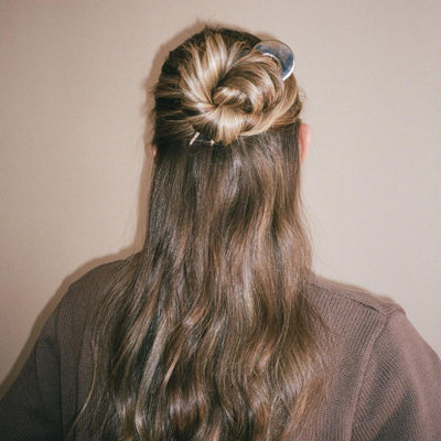Model wearing Hair Pin in Tiara in hair.