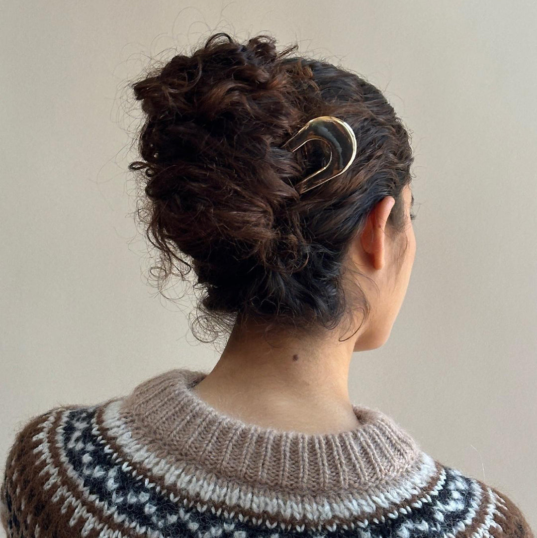 Closeup of model wearing Hair Pin in Gold Tiara in hair.
