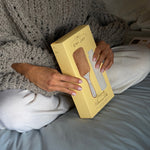 model holding Heavenly Blowout Gift Set