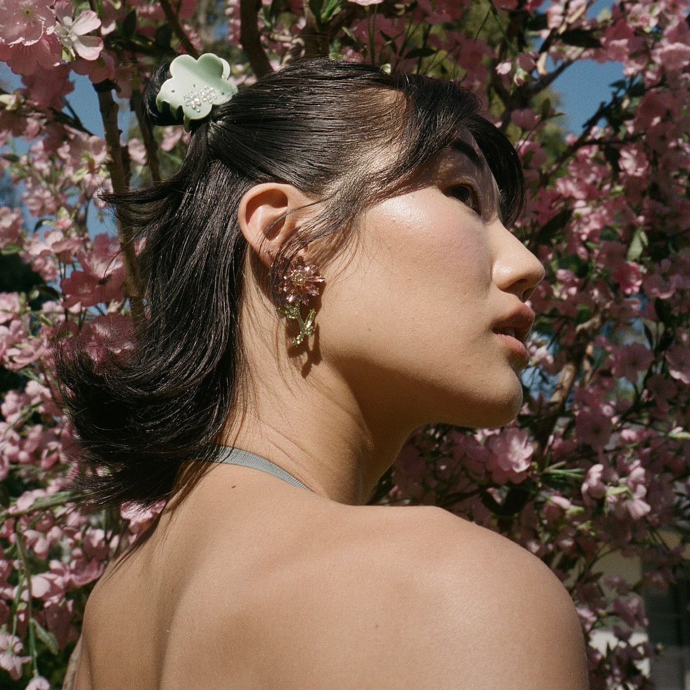 Model wearing Midi Blossom Clip in Pear