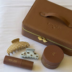 assorted emi jay clips and hair care with On The Way Vanity Case in Toasted Sugar