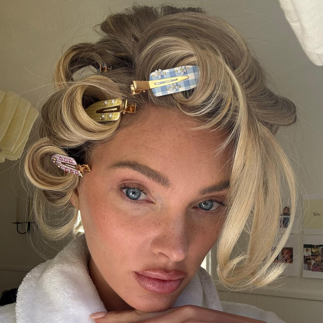 closeup of model wearing assorted heavenly hair milk popstar clips in hair