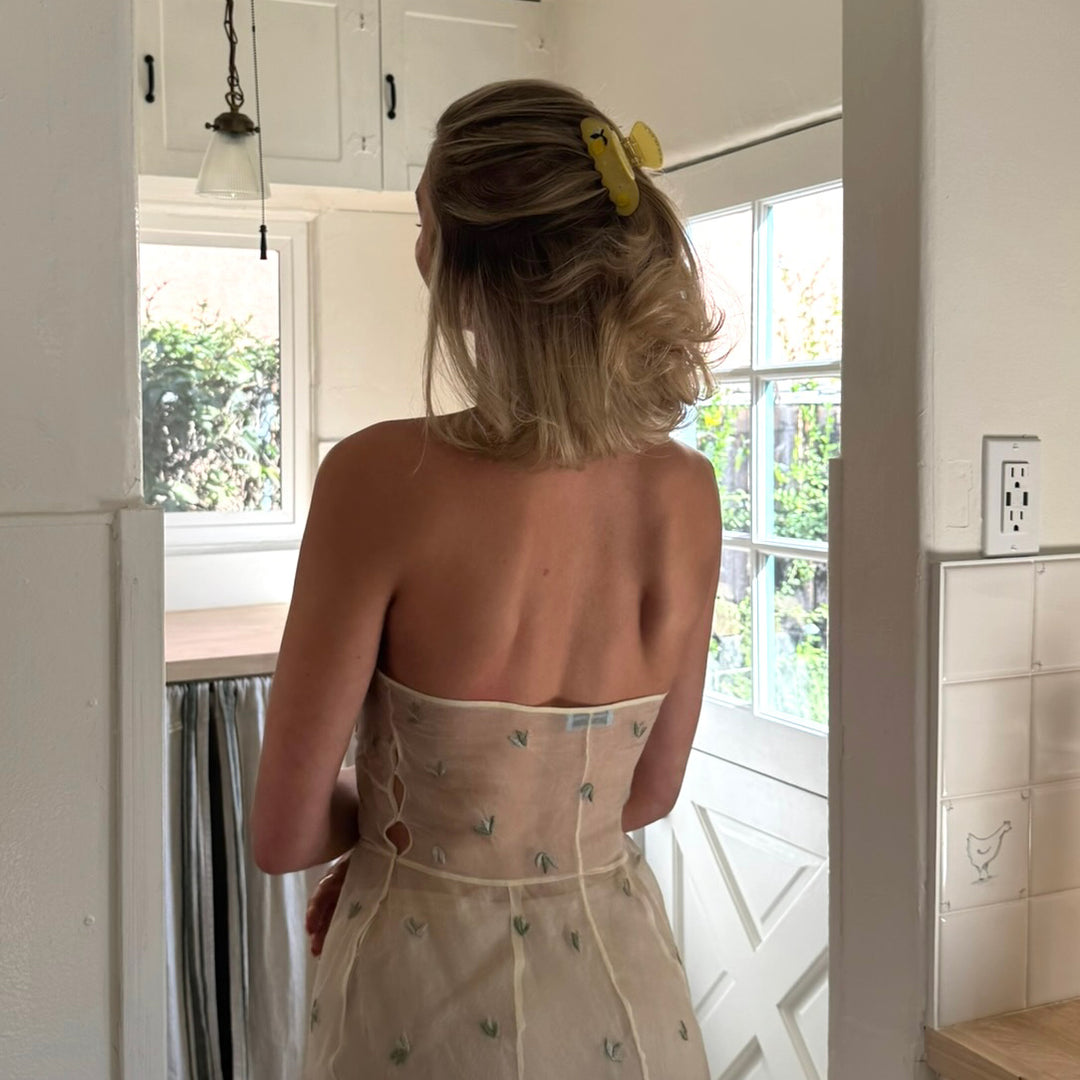 elsa hosk standing in doorway wearing Sweetheart Clip in Hugo Spritz in hair