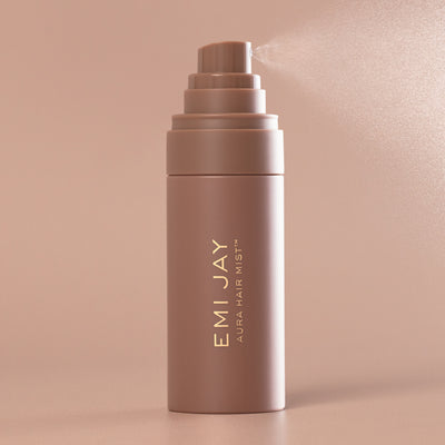 Aura Hair + Body Mist™ in Toasted Sugar spraying mist