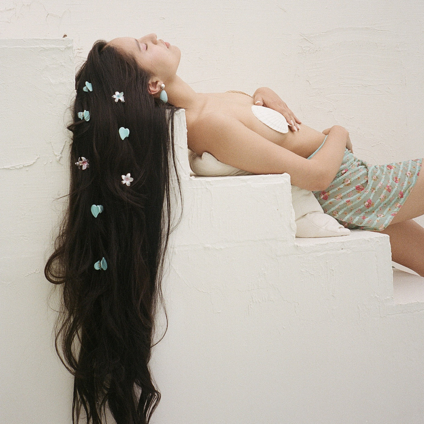 model wearing Baby Heart Clip Set in Aqua Love in hair