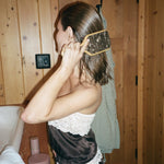 olivia jade brushing hair with bamboo paddle brush