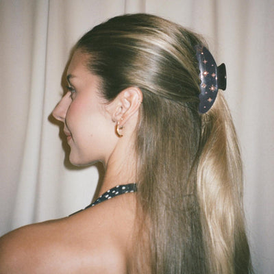 model wearing Big Effing Clip in Afterglow in hair