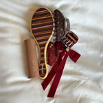 assorted nightcap hair accessories with aura hair + body mist