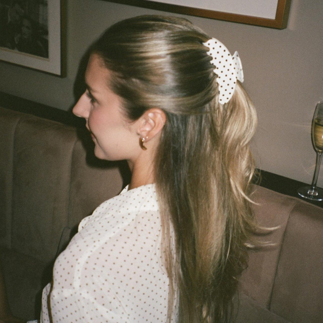 model wearing Big Effing Clip in Blanc Polka Dot in hair