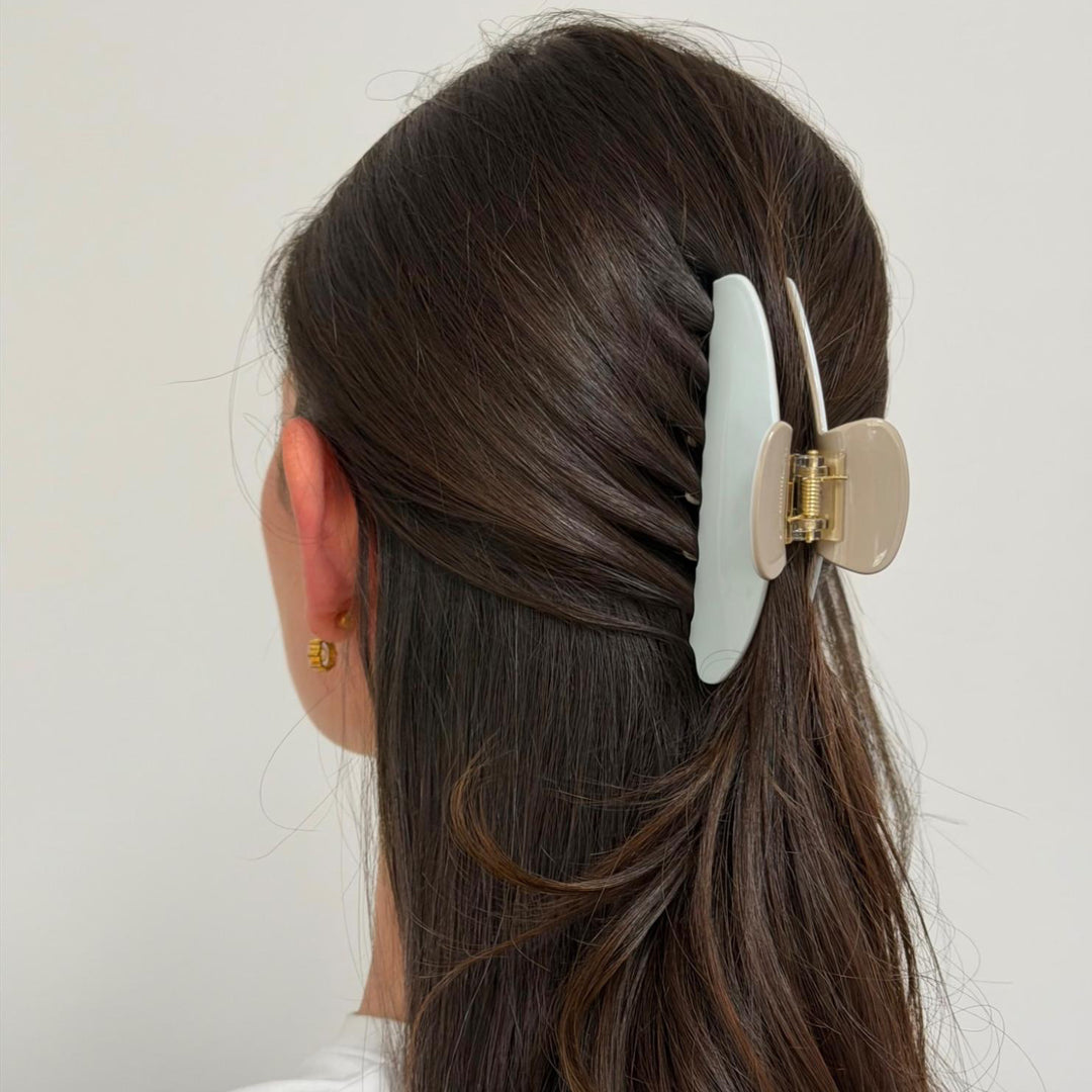 model wearing Big Effing Clip in Marshmallow and Creme in hair