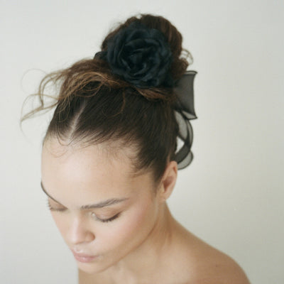 model with Camellia Scrunchie in Dusk in hair
