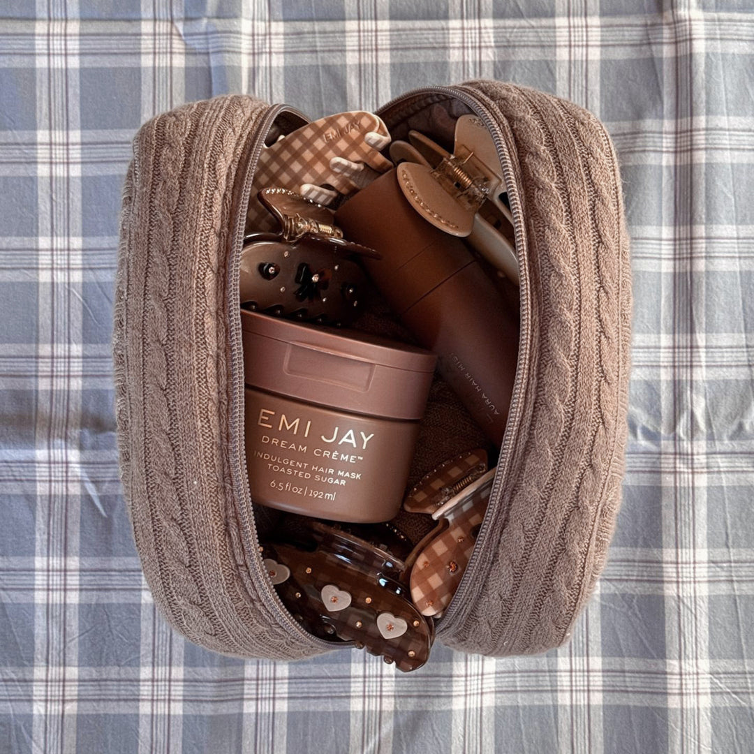 Cozy Pouch in Cookie Crumbs Knit with assorted hair care and accessories