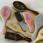 Assorted Flat and Mini Boar Brushes with custom Emi Jay 