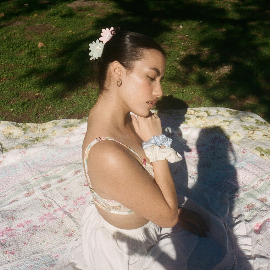 model wearing Dahlia Clip in Cherry Blossom in hair