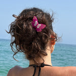 model wearing Hair Pin in Orchid Papillon