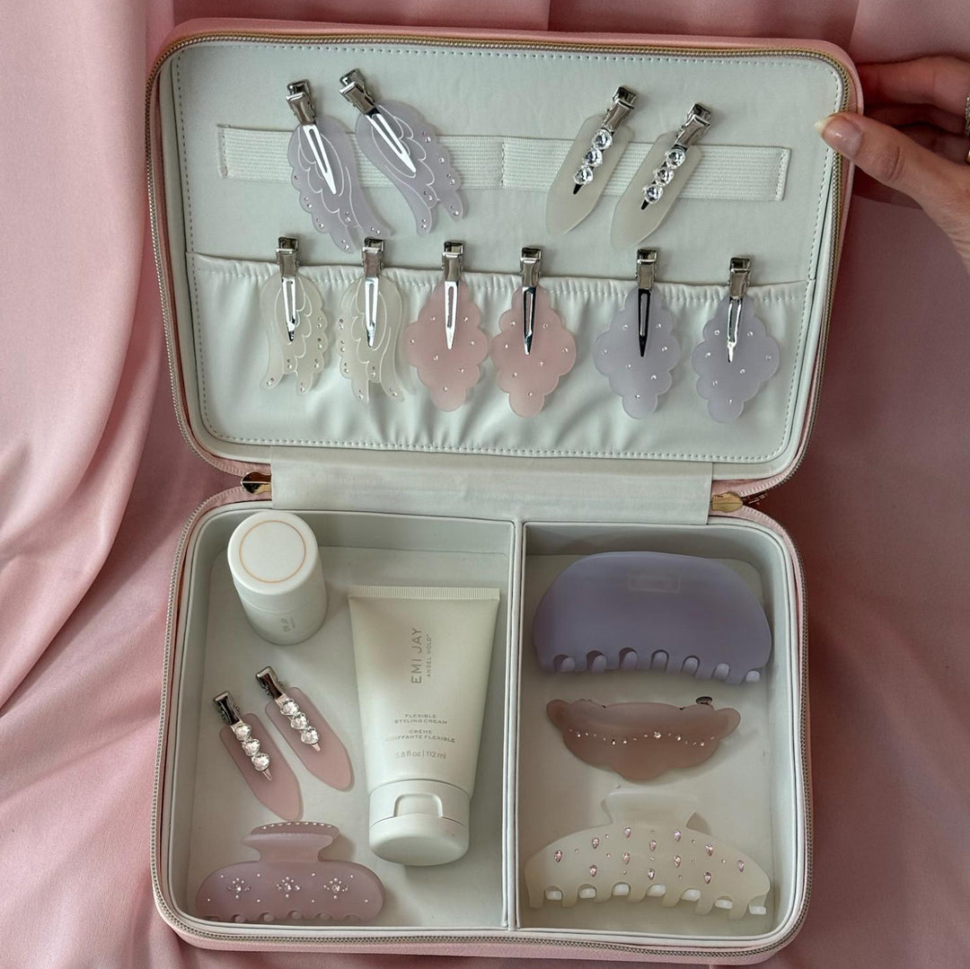 vanity case with assorted emi jay hair care and accessories