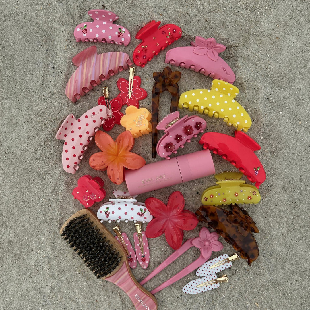 aura hair + body mist in lychee baby with assorted emi jay hair accessories and brush