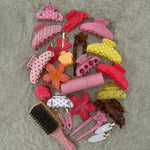 aura hair + body mist in lychee baby with assorted emi jay hair accessories and brush