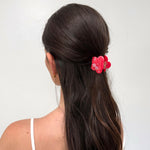 model wearing Midi Blossom Clip in Sangria Bloom in hair