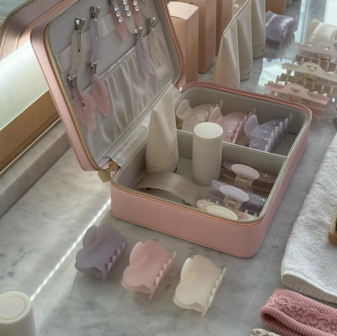 assorted emi jay hair care and accessories with vanity case