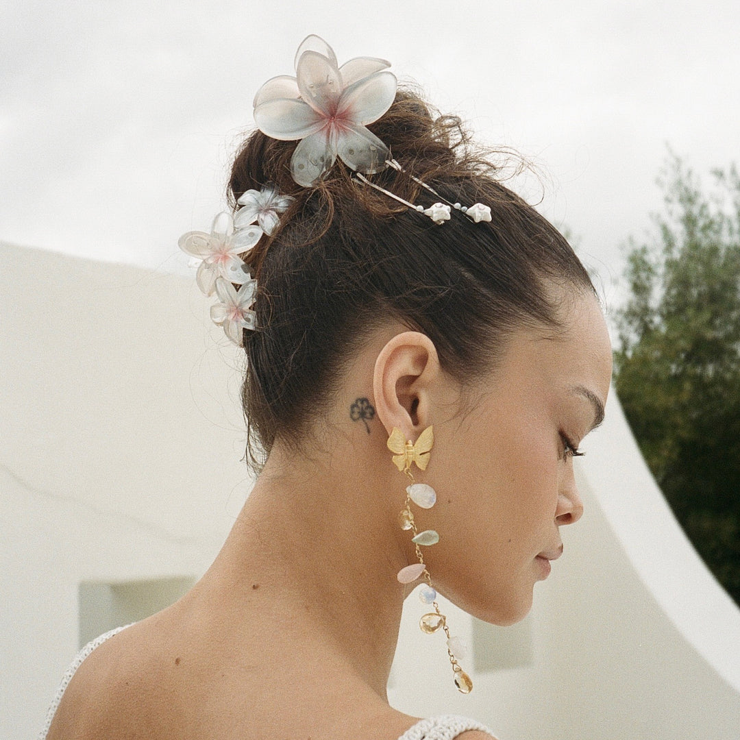 model wearing Miss Super Bloom Clip in Rose Pearl in hair