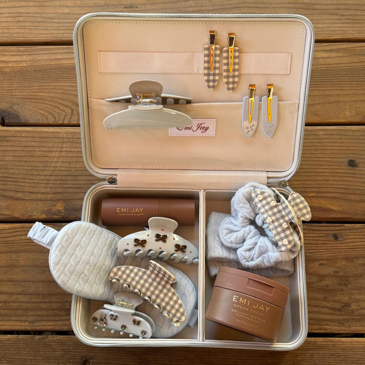 Assorted emi jay hair care and accessories in On The Way Vanity Case