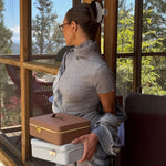 olivia jade holding on the way vanity cases while wearing big effing clip in hair