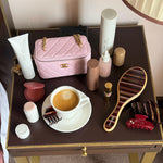 assorted emi jay hair care and accessories on table with coffee