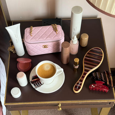 assorted emi jay hair care and accessories on table with coffee