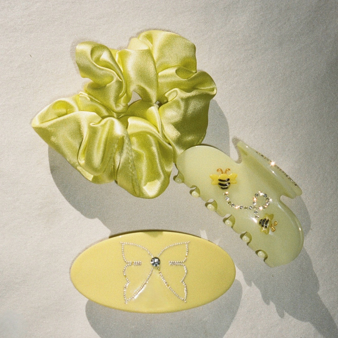 Sweet Dreams Silk Scrunchie in Dandelion with assorted hair accessories