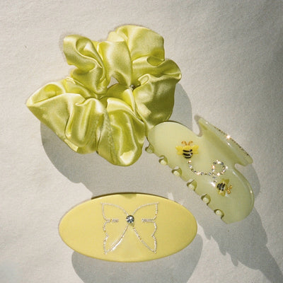 Sweet Dreams Silk Scrunchie in Dandelion with assorted hair accessories