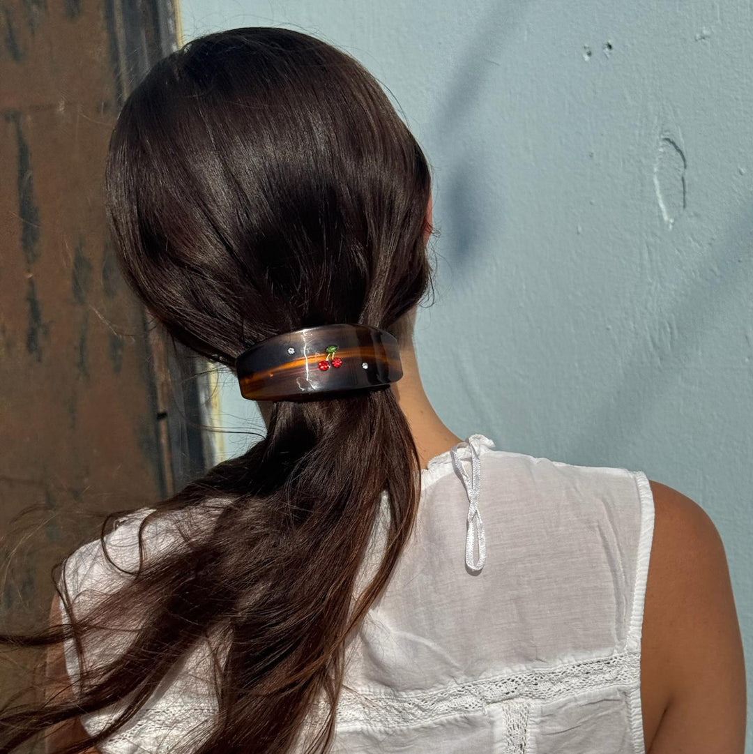 model wearing Ponytail Barrette in Tortoise Cherry in hair
