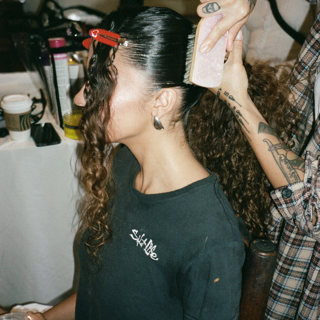 model wearing Popstar Clips in Amour Rouge in hair