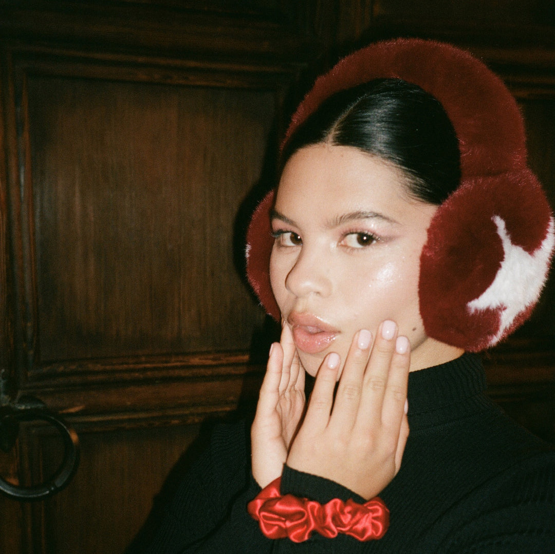 closeup of model wearing Sugar Muffs in Red Currant