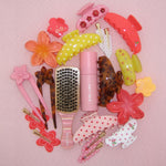 aura hair + body mist in lychee baby with assorted emi jay hair accessories and brush