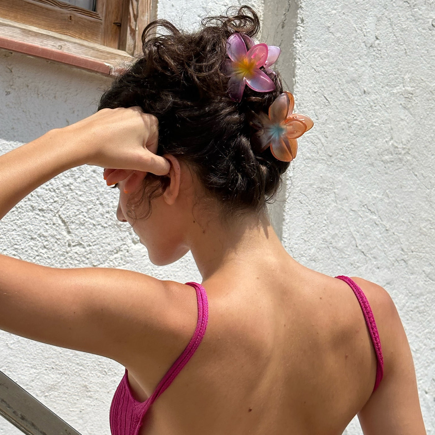 model wearing Super Bloom Clip in Nectarine + Peony Pearl